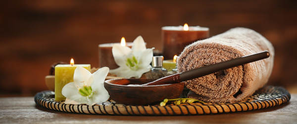 Spa Chocolate Set With Candles On Brown Background